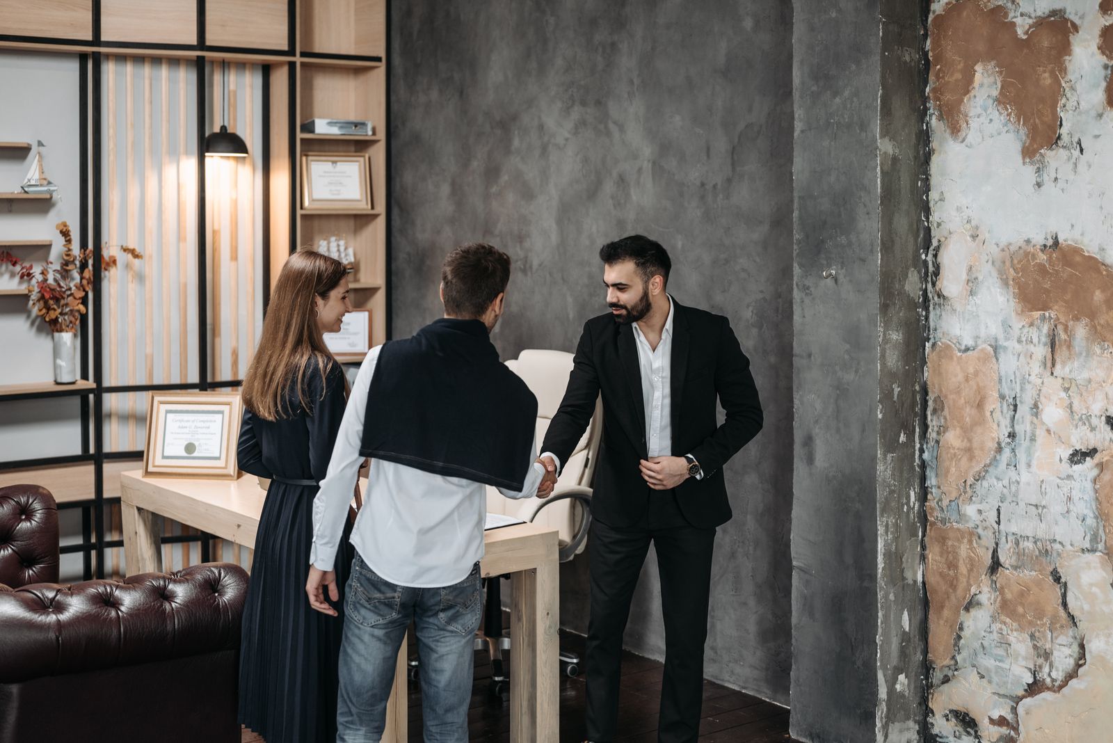 A Keystone underwriter and originator reviewing a file together