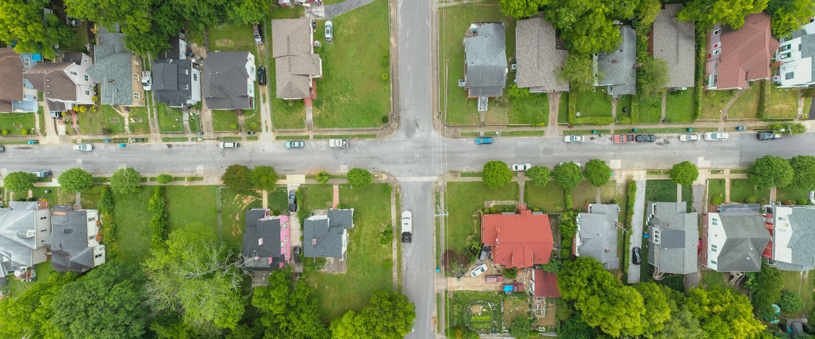 Tree-lined suburban neighborhood seen from above